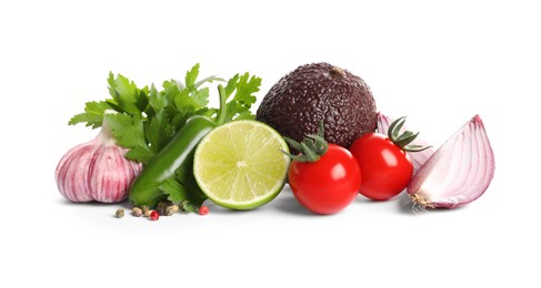 Fresh ingredients for guacamole on white background