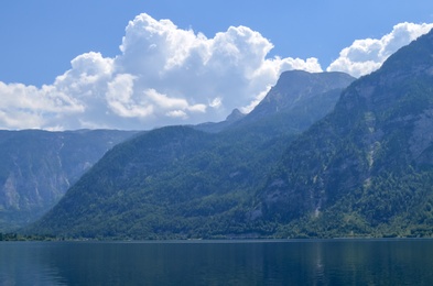 Photo of Picturesque view of river and mountains on sunny day