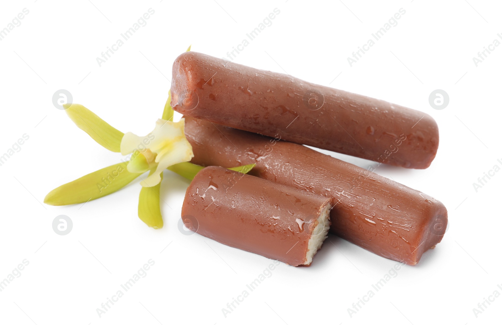 Photo of Glazed curd cheese bars and vanilla flower isolated on white