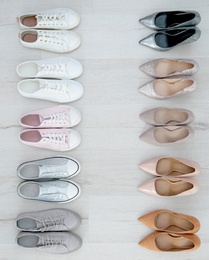 Collection of different shoes on floor, flat lay with space for text