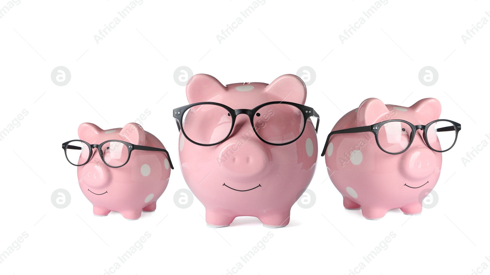 Image of Pink ceramic piggy banks in glasses on white background