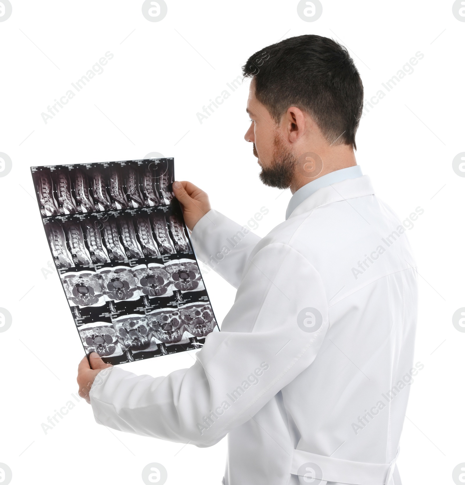 Photo of Orthopedist holding X-ray picture on white background