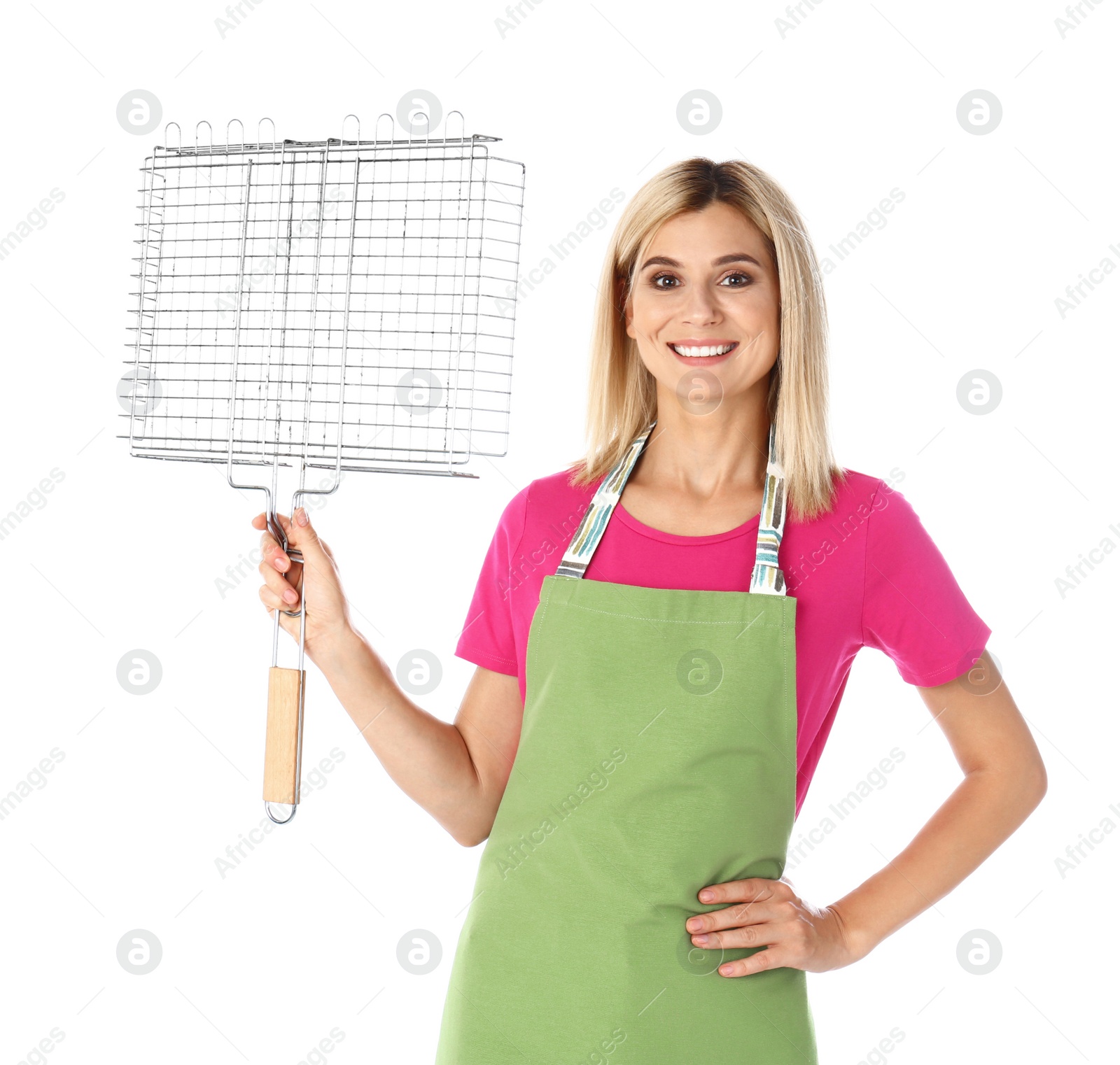 Photo of Woman in apron with grill grate for barbecue on white background