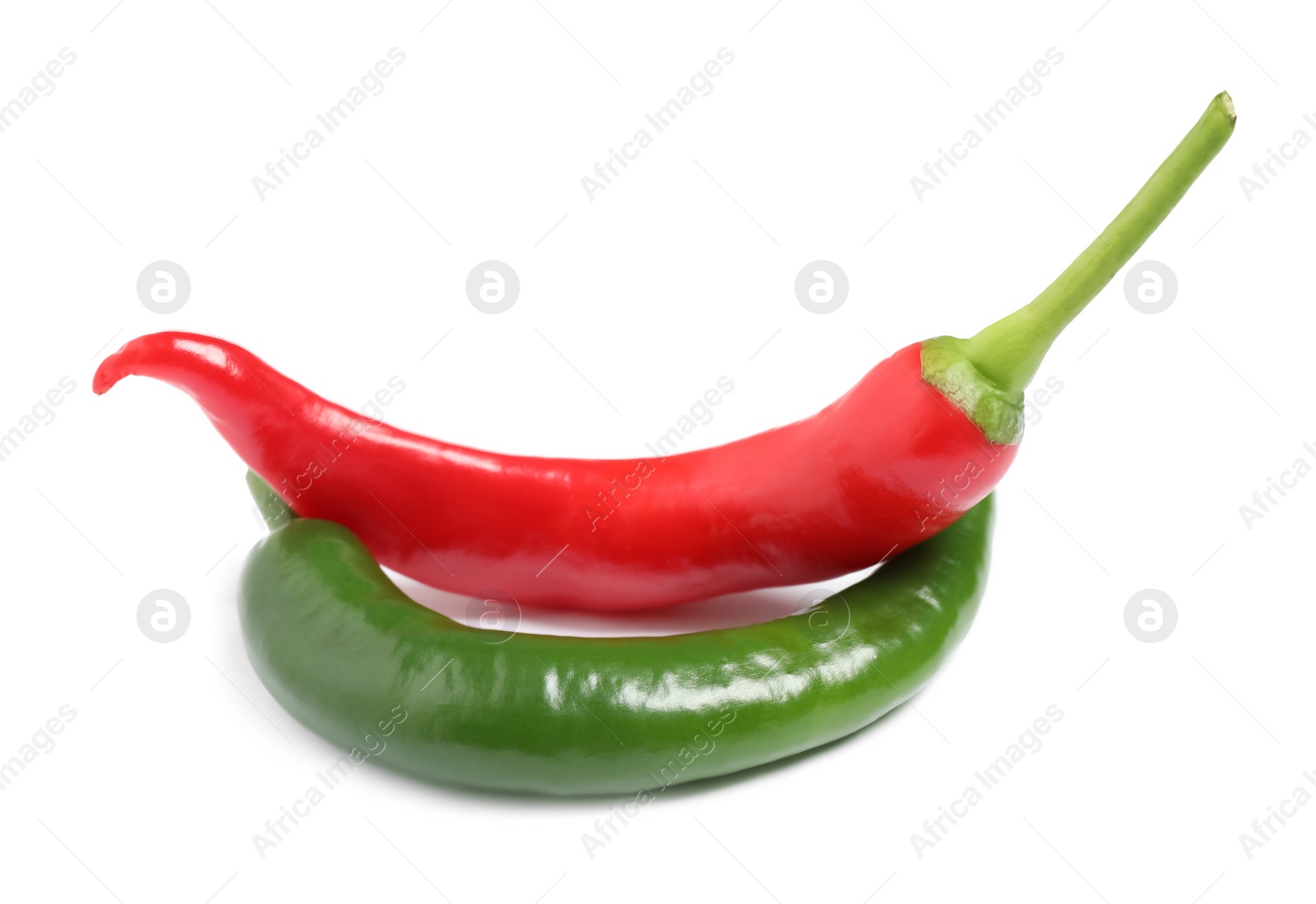 Photo of Ripe hot chili peppers on white background