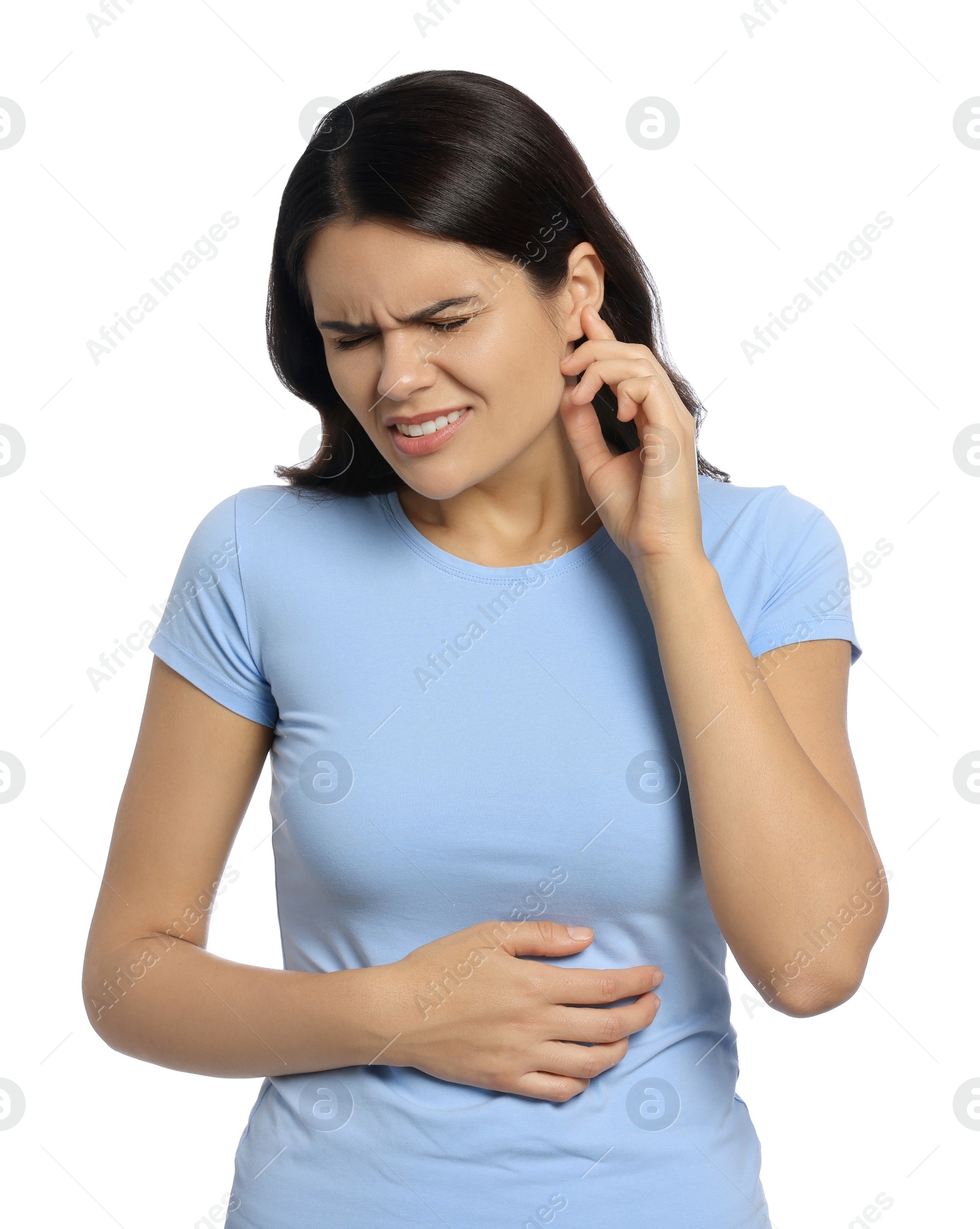 Photo of Young woman suffering from ear pain on white background