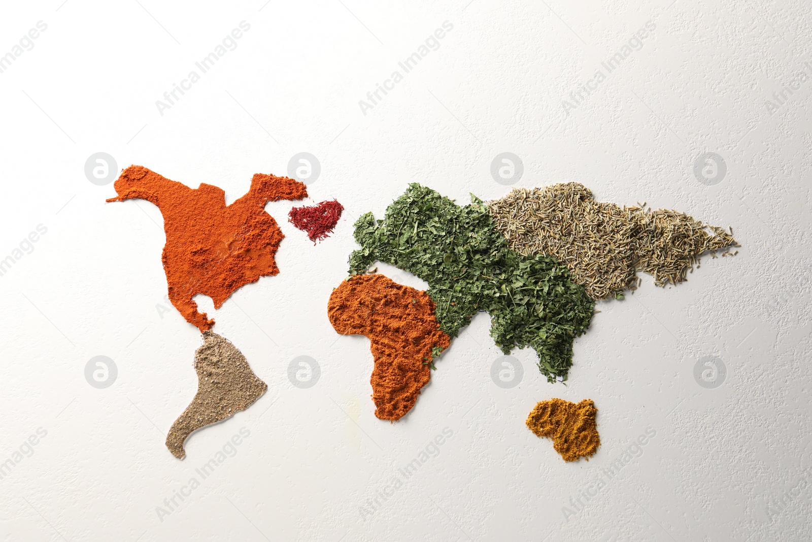 Photo of World map of different spices on white textured table, flat lay