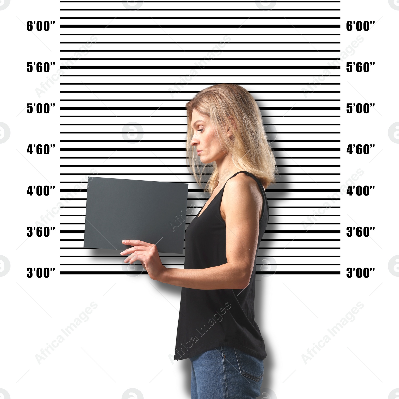 Image of Criminal mugshot. Arrested woman with blank card against height chart