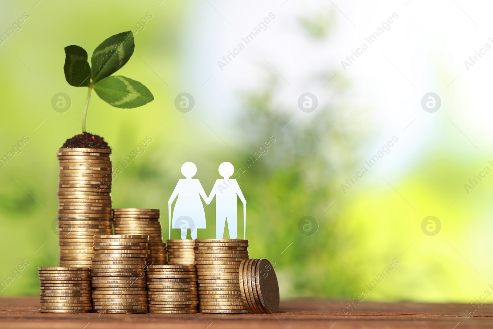 Image of Pension concept. Elderly couple illustration, coins and sprout on wooden table. Space for text