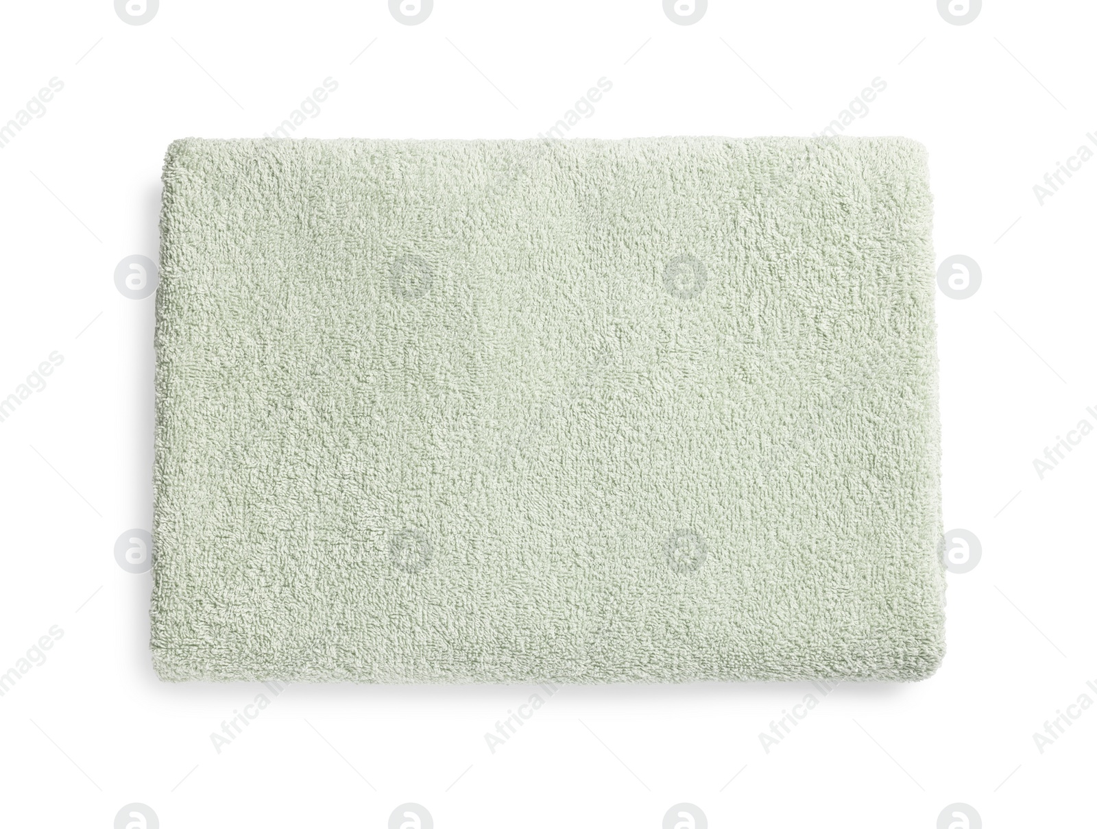 Photo of Soft light green terry towel isolated on white, top view