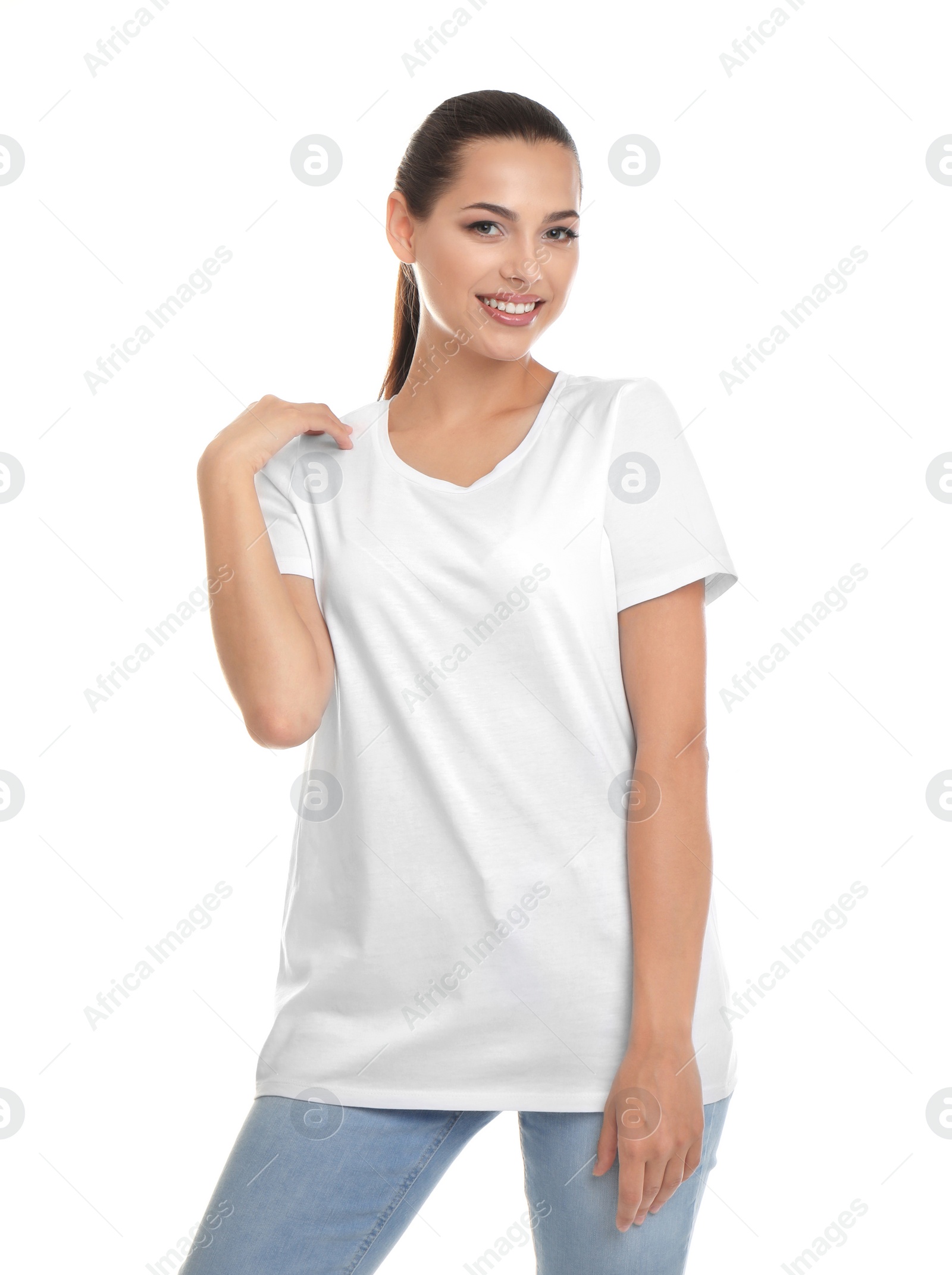 Photo of Young woman in t-shirt on white background. Mockup for design