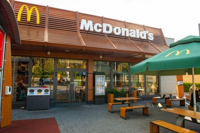 WARSAW, POLAND - SEPTEMBER 16, 2022: View of McDonald's restaurant on city street