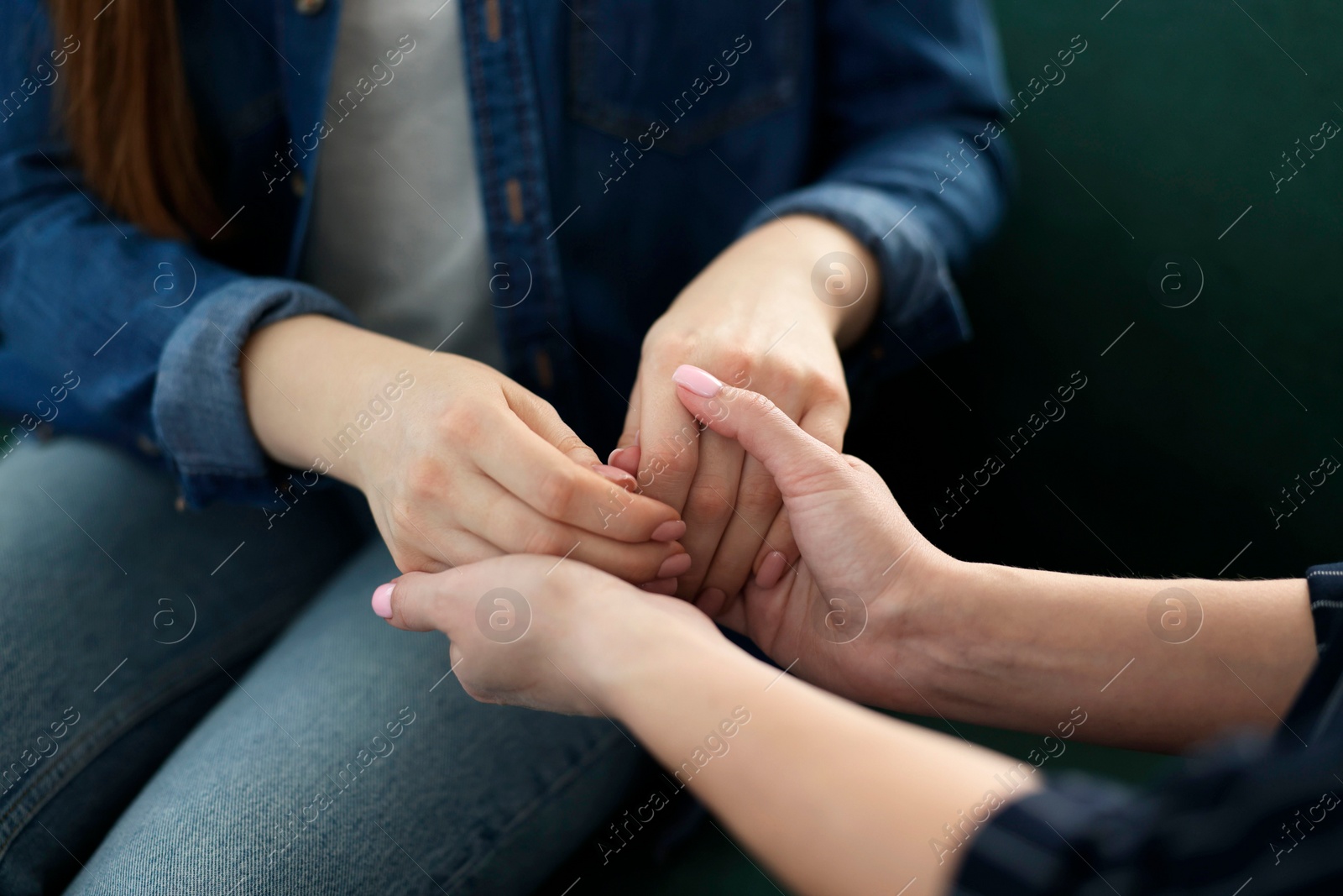 Photo of Psychotherapist working with patient in office, closeup