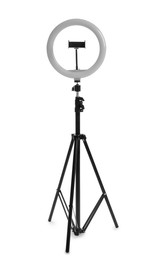 Photo of Modern tripod with ring light isolated on white