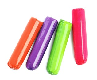 Photo of Colorful tampons on white background, top view. Menstrual hygiene product