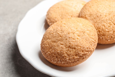 Photo of Plate with Danish butter cookies on table, closeup