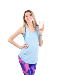 Photo of Beautiful young woman in sportswear drinking milk on white background