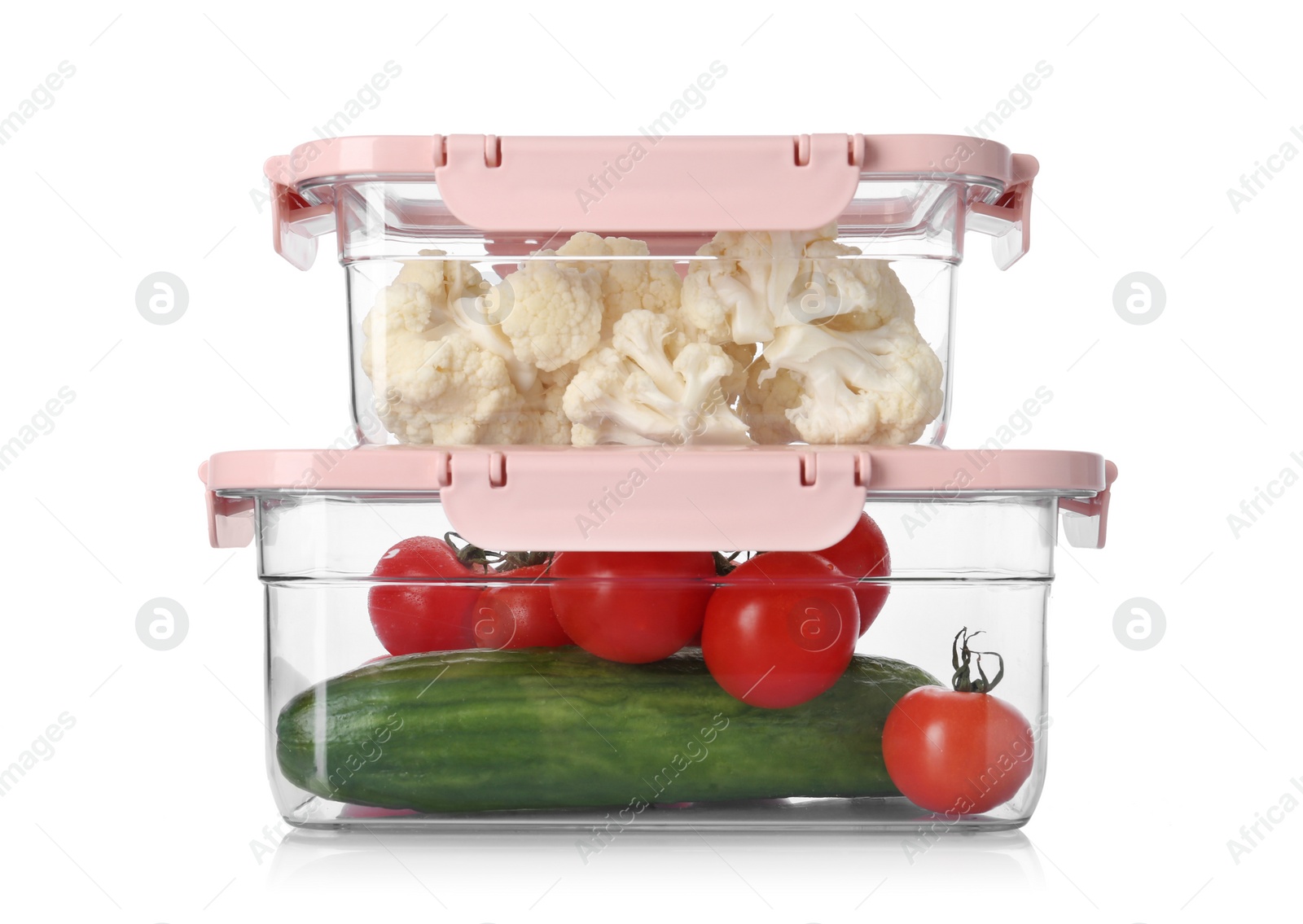 Photo of Boxes with fresh raw vegetables on white background