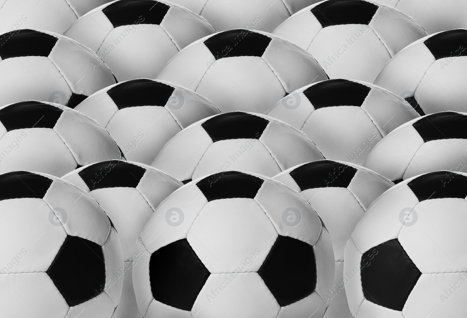 Image of Many new soccer balls as background, closeup