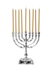 Photo of Hanukkah menorah with candles on white background