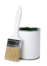 Photo of Paint can and brush on white background