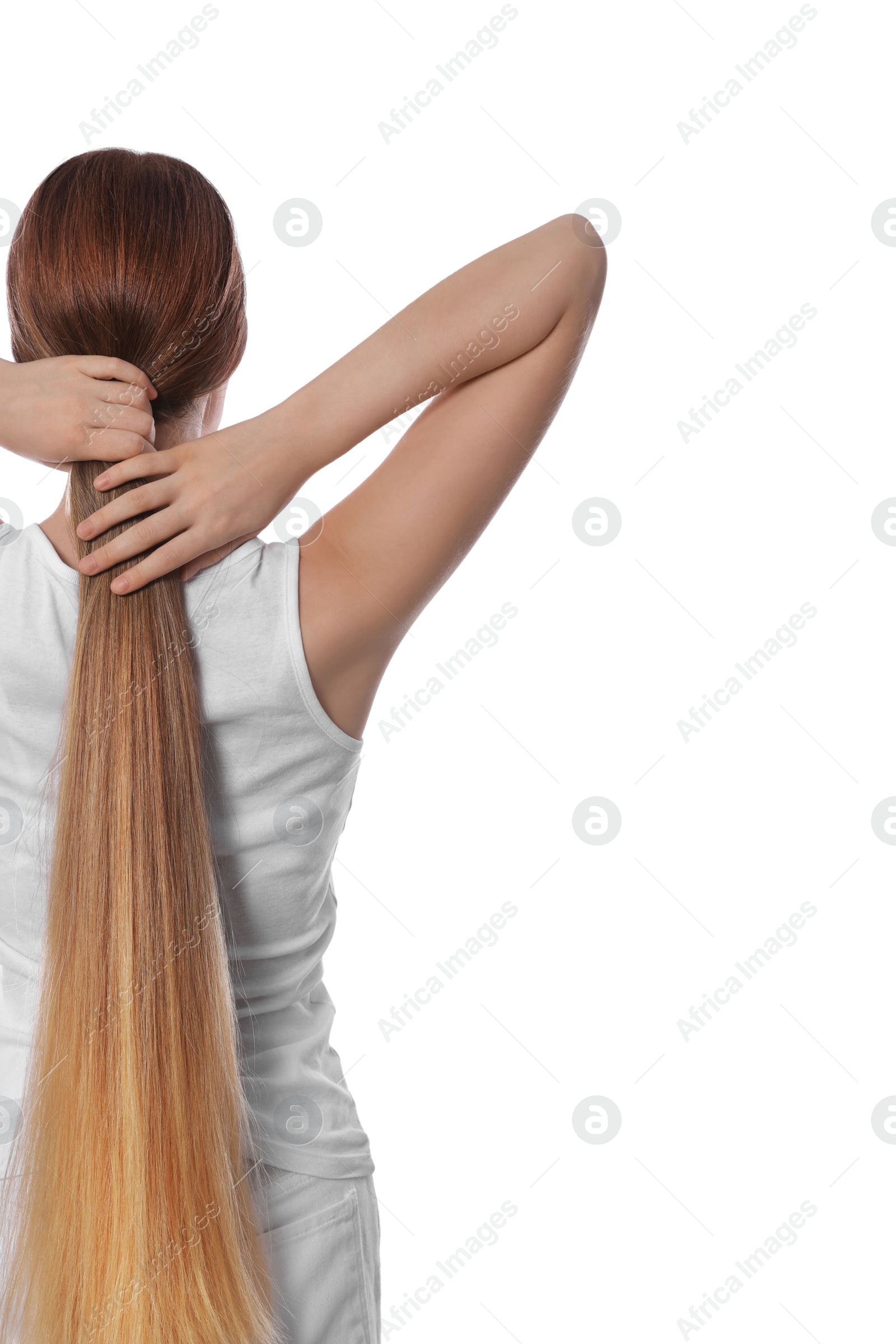 Photo of Teenage girl with strong healthy hair on white background, back view