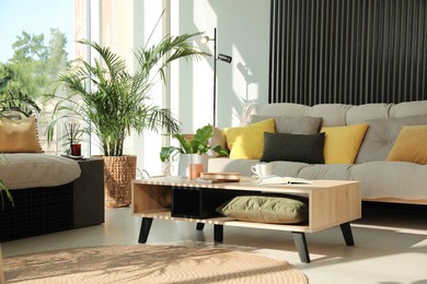 Photo of Indoor terrace interior with modern furniture and houseplants