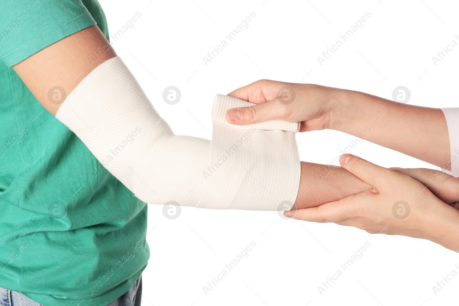 Photo of Doctor applying bandage onto patient's arm on white background, closeup