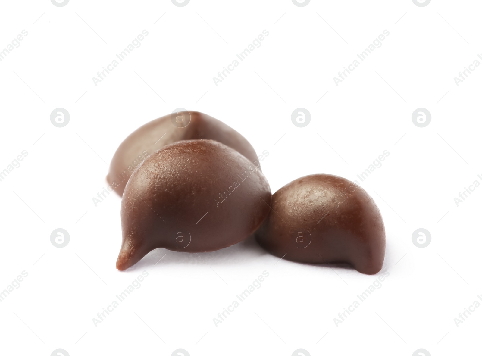 Photo of Delicious chocolate chips on white background