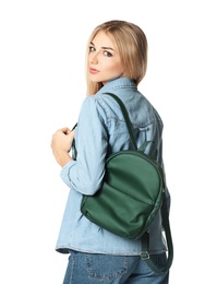 Fashionable young woman with backpack isolated on white