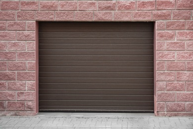 Photo of Closed roller shutter door of modern garage