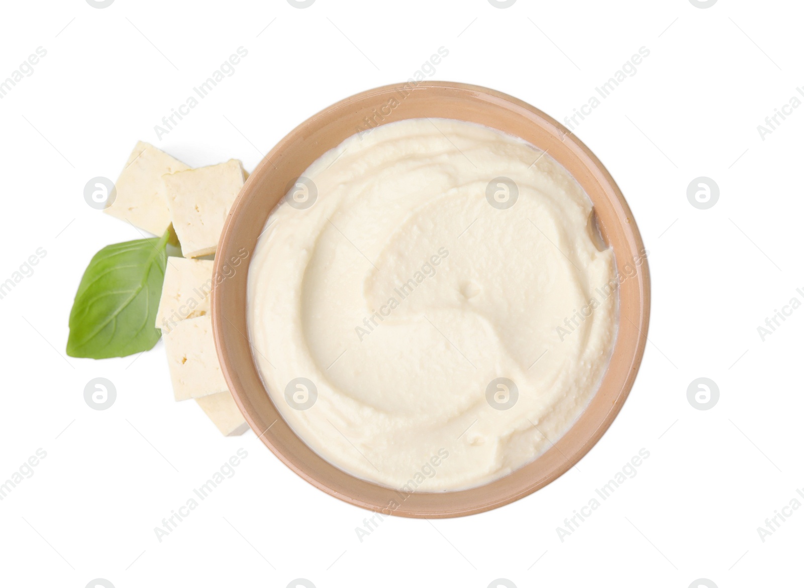 Photo of Delicious tofu, sauce and basil leaf isolated on white, top view