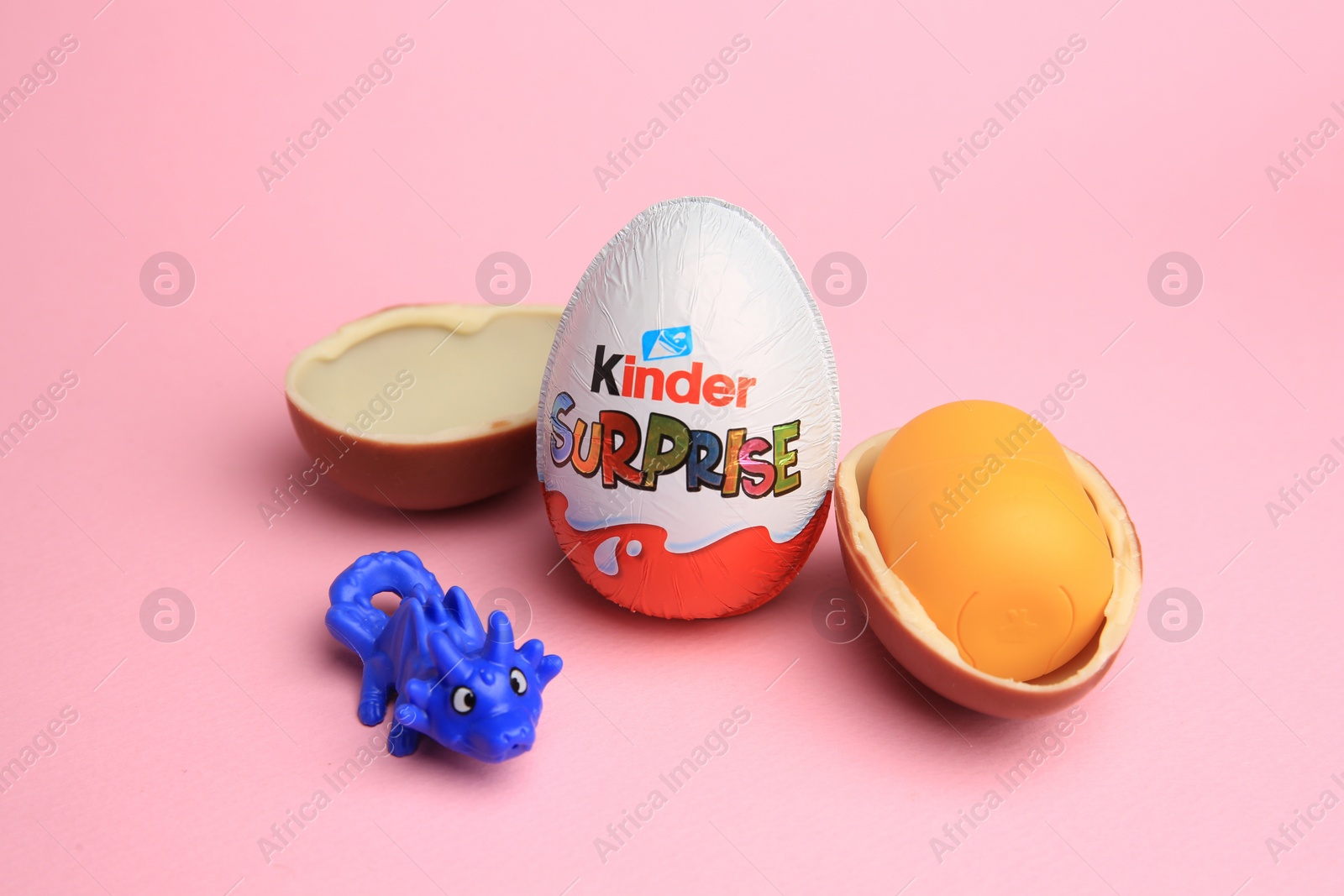 Photo of Sveti Vlas, Bulgaria - July 3, 2023: Kinder Surprise Eggs, plastic capsule and toy on pink background