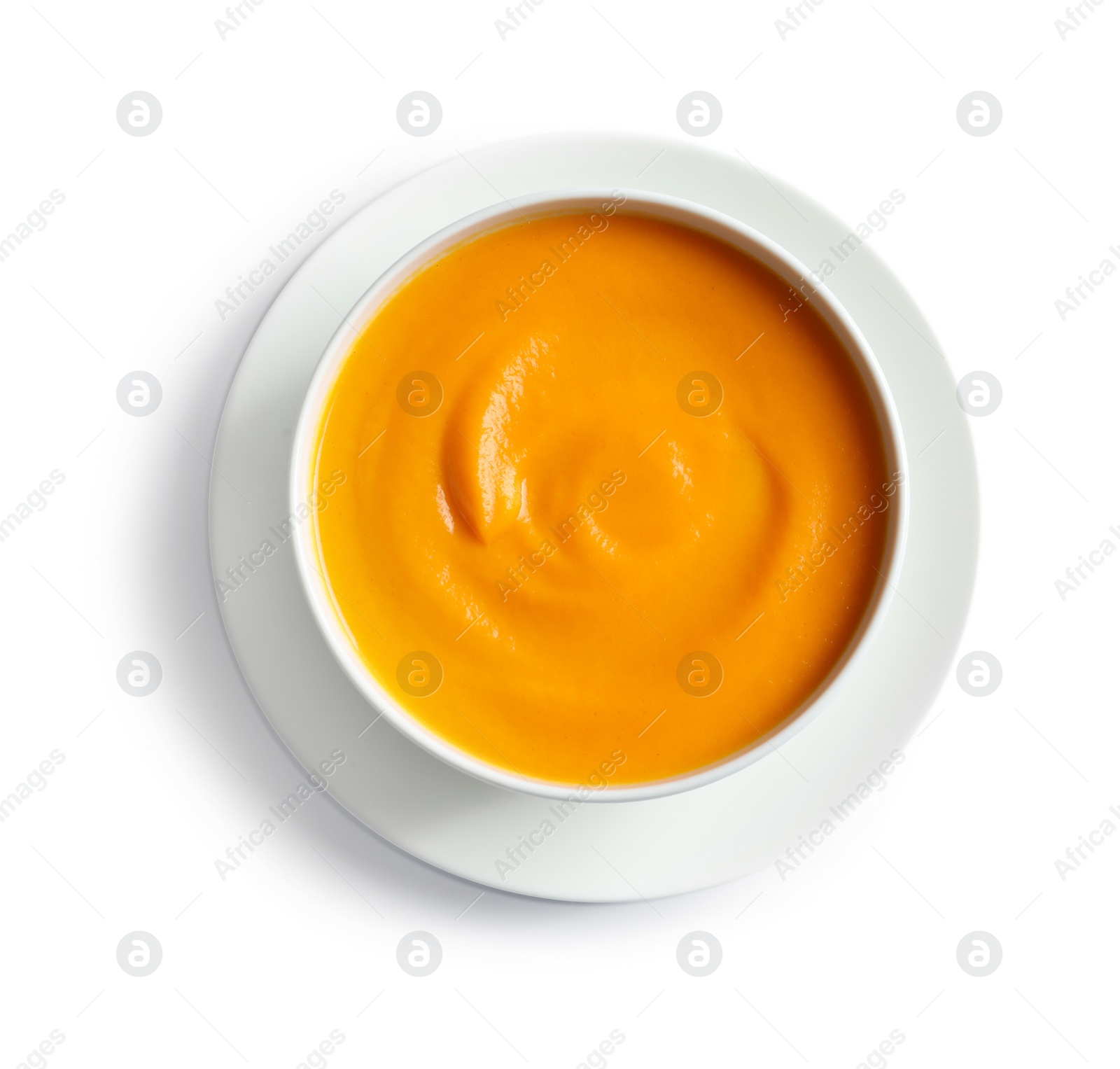 Photo of Delicious pumpkin cream soup in bowl on white background, top view