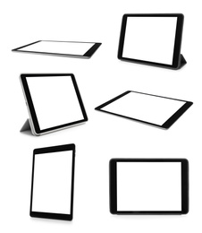 Image of Set of tablet computers on white background