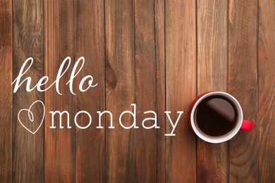 Image of Cup of hot aromatic coffee and phrase Hello Monday on wooden background, top view