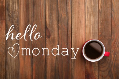 Cup of hot aromatic coffee and phrase Hello Monday on wooden background, top view