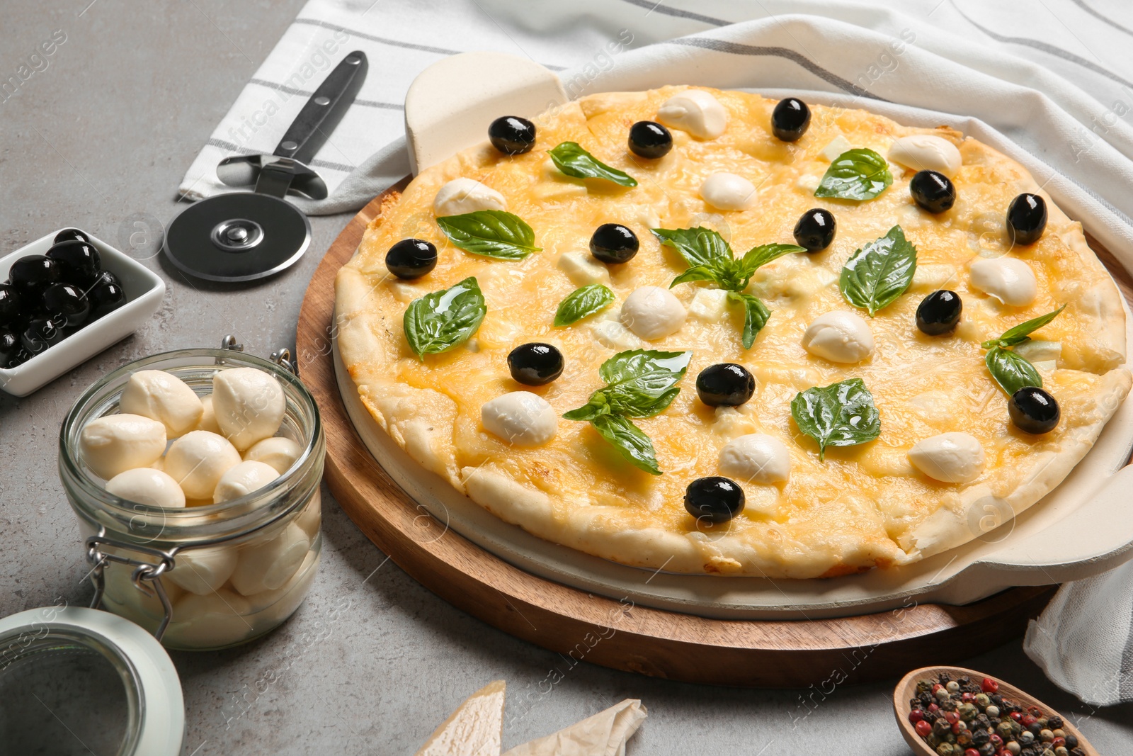 Photo of Composition with tasty homemade pizza on table