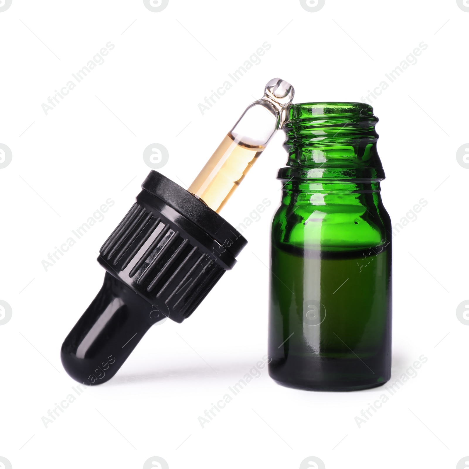 Photo of Cosmetic bottle and pipette with essential oil on white background