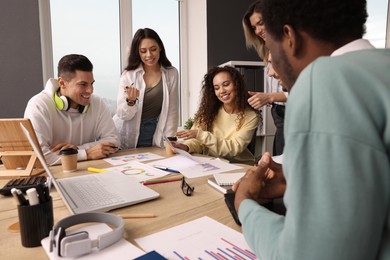 Team of employees working together in office. Startup project