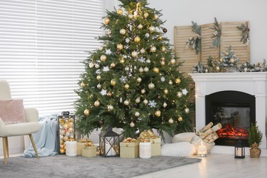Photo of Stylish living room interior with decorated Christmas tree and fireplace