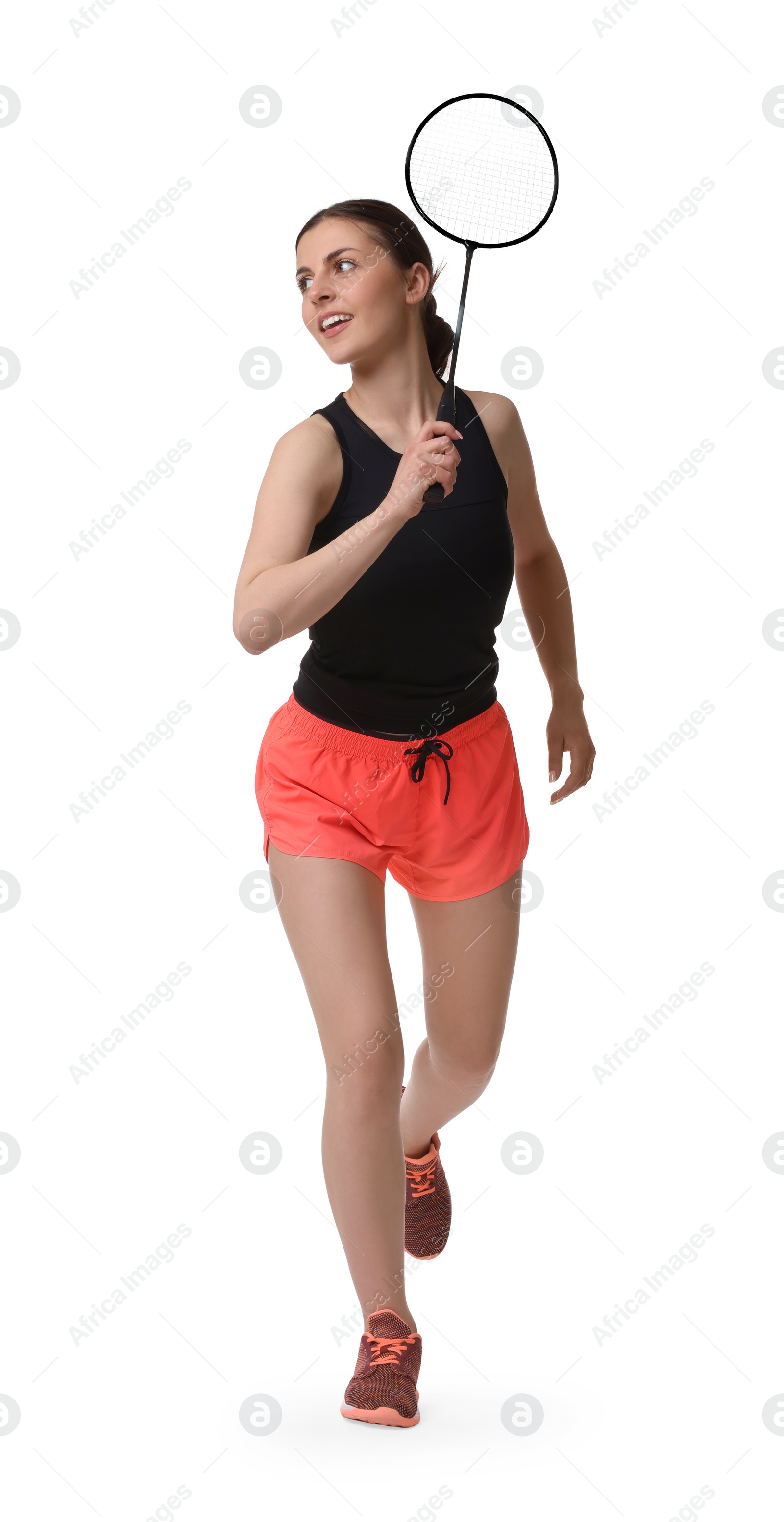 Photo of Young woman playing badminton with racket on white background