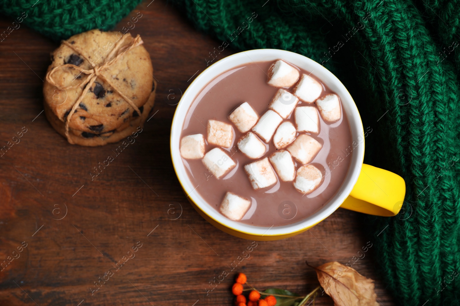 Photo of Flat lay composition with cup of hot drink on wooden table. Cozy autumn atmosphere