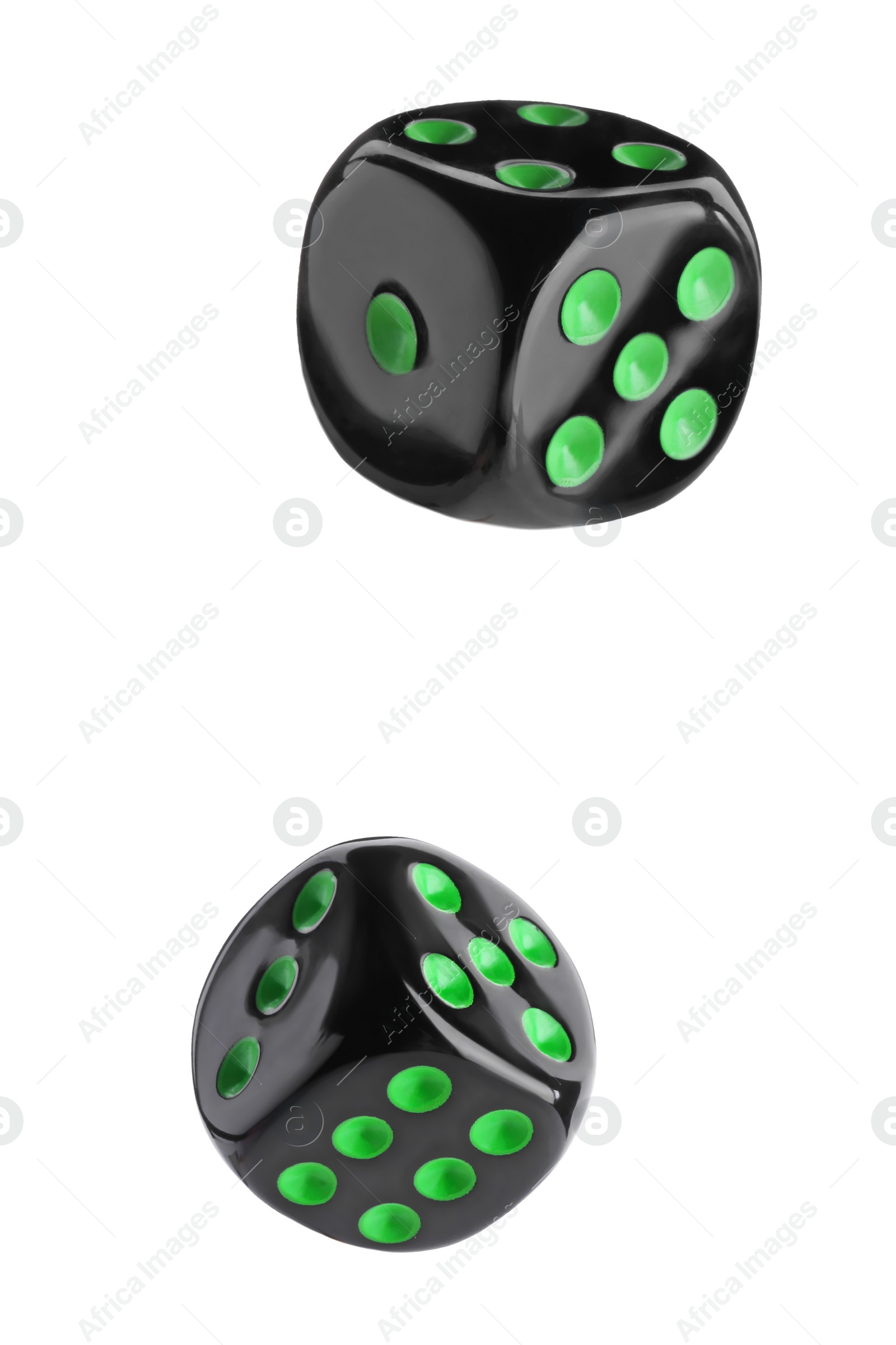 Image of Two black dice in air on white background