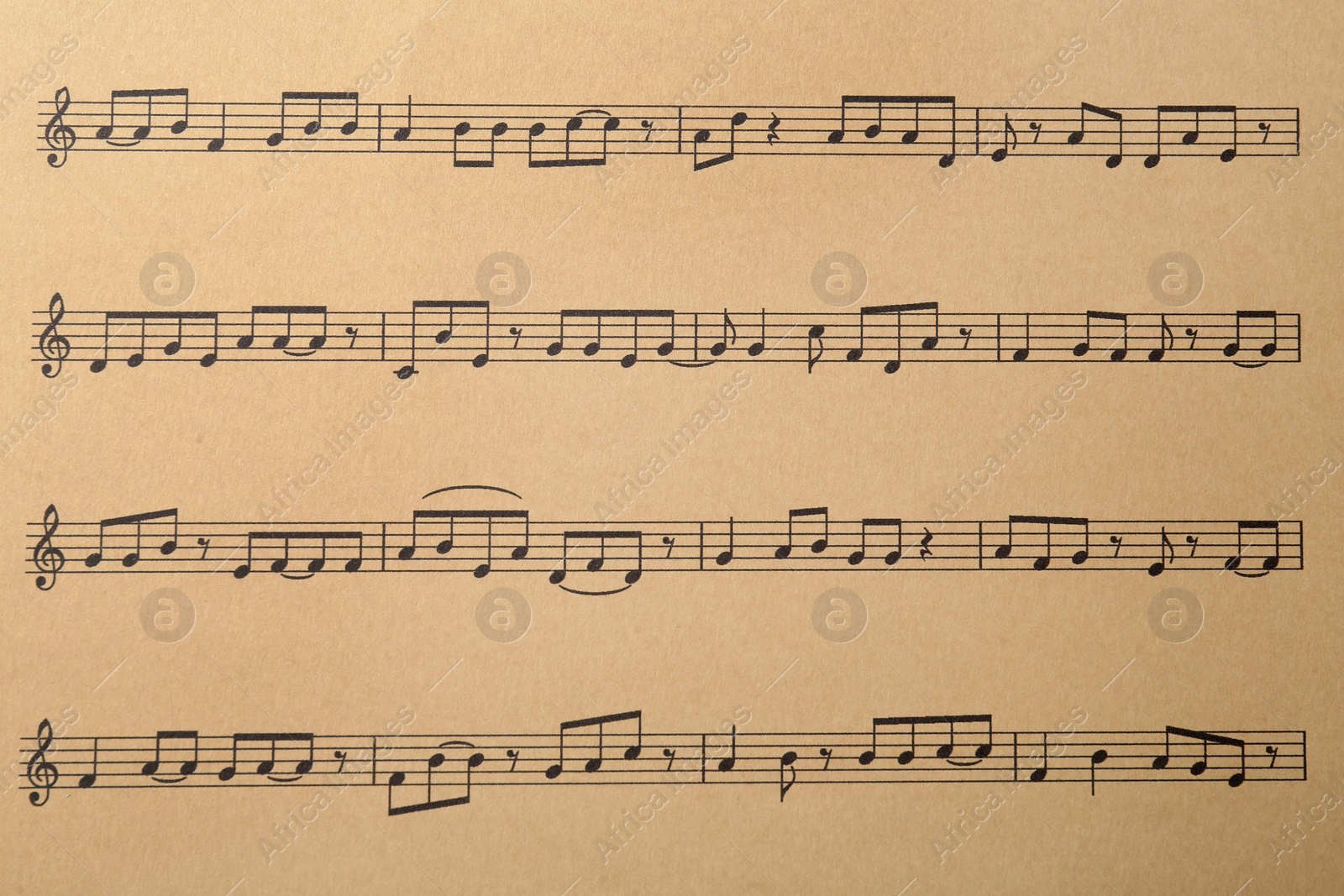 Photo of Paper sheet with musical notes, closeup view