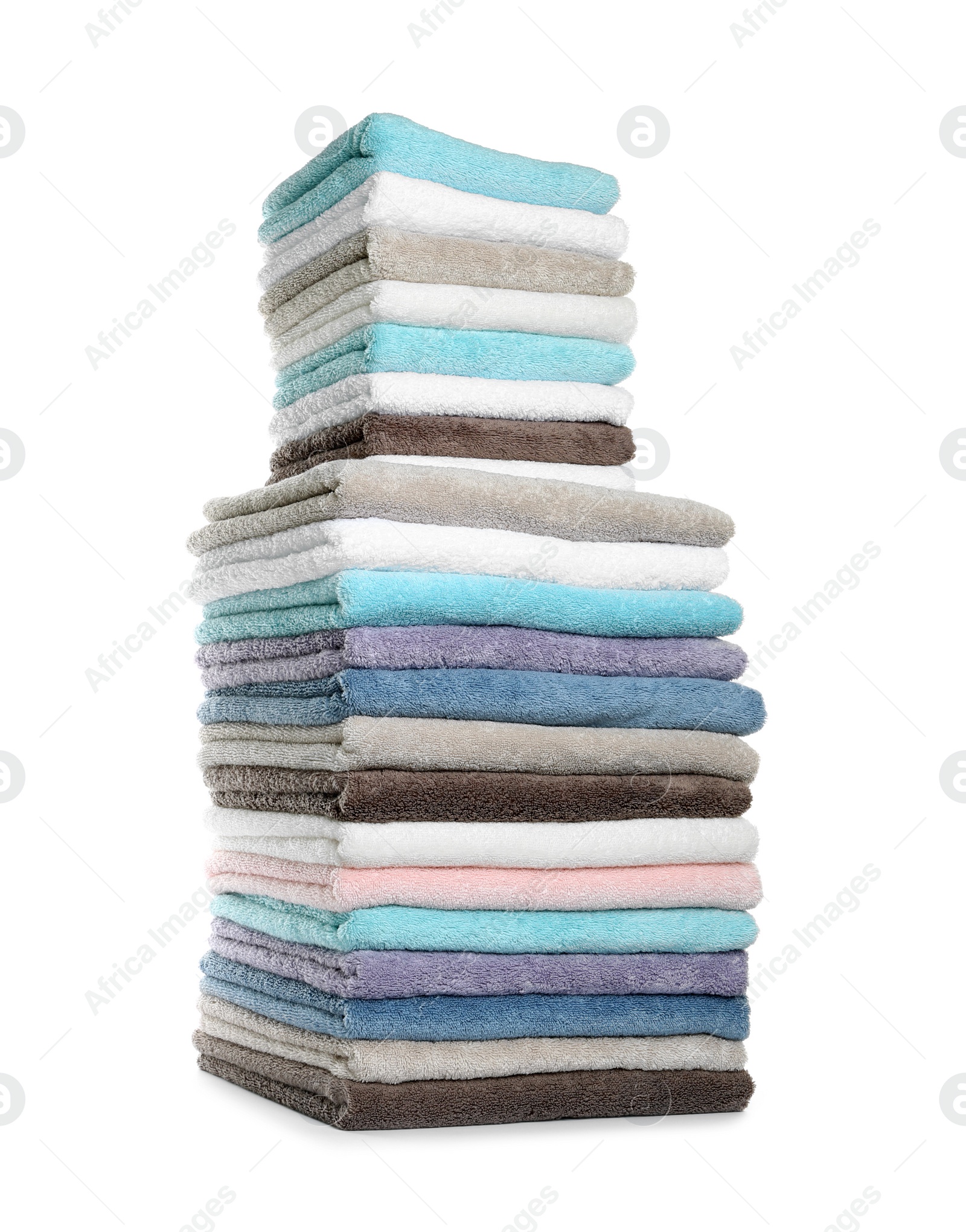 Photo of Different fresh soft terry towels on white background