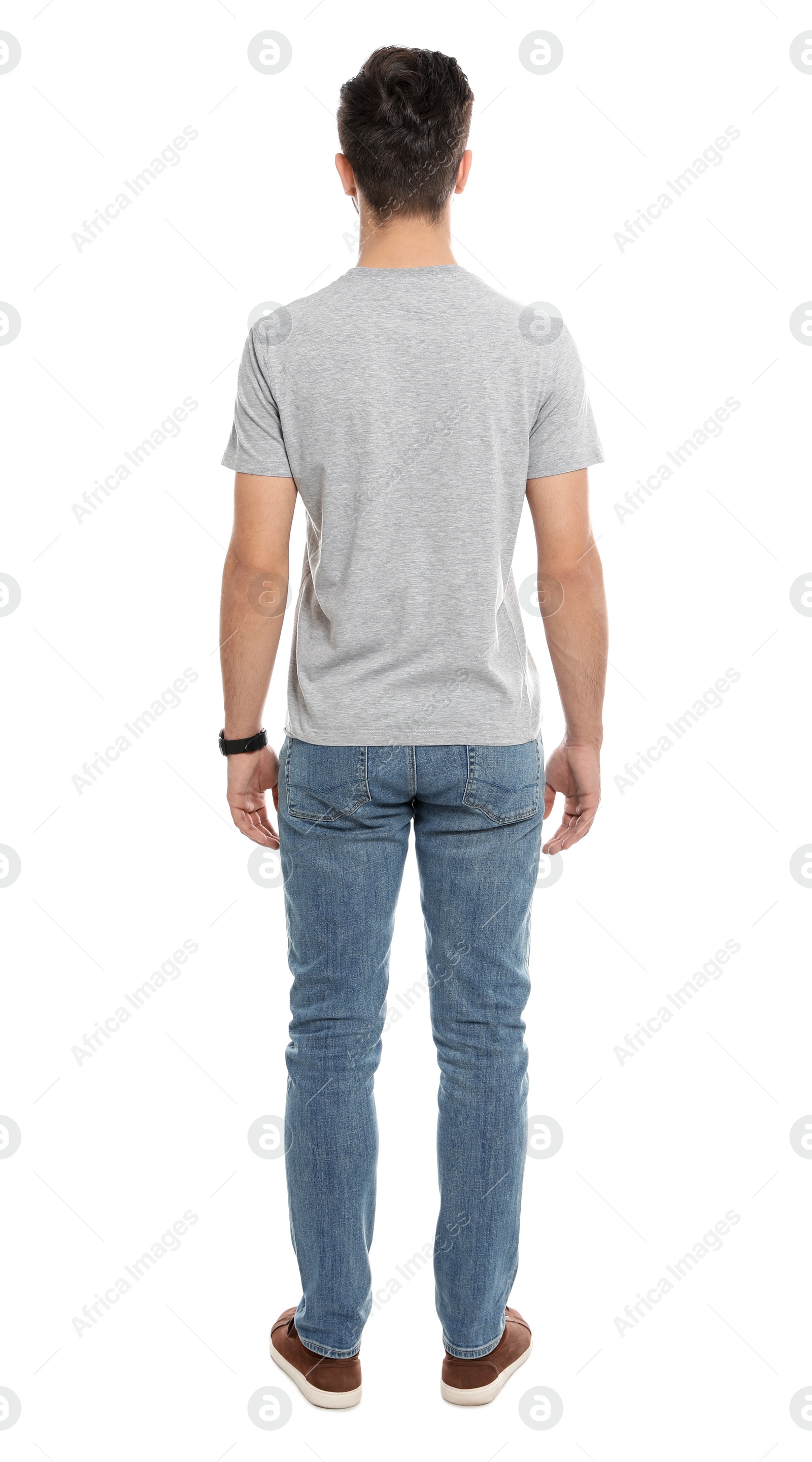 Photo of Young man in t-shirt on white background. Mock up for design