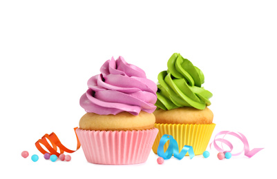 Photo of Delicious birthday cupcakes with buttercream on white background