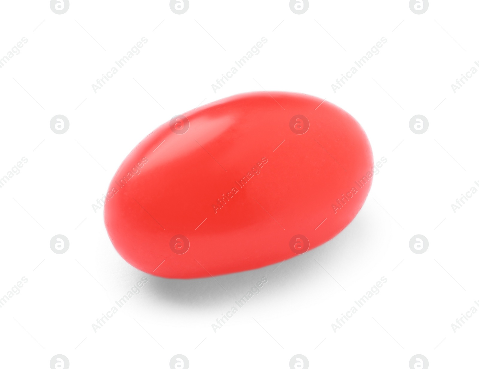 Photo of Tasty red jelly bean isolated on white