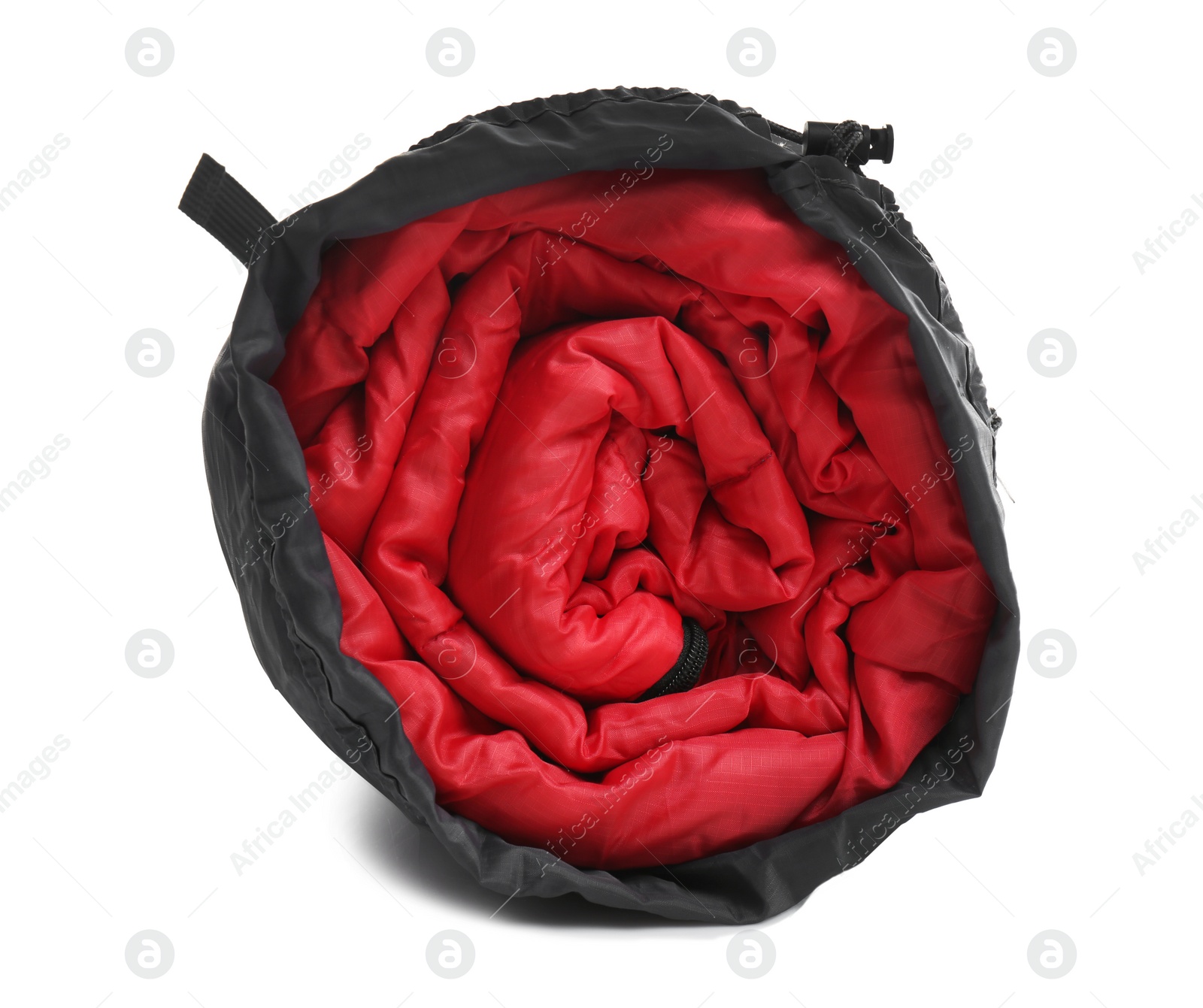 Photo of Sleeping bag in case on white background. Camping equipment