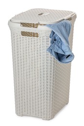 Plastic laundry basket with garment isolated on white